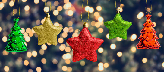 Wall Mural - Christmas bauble hanging decoration with bokeh light background celebration holiday banner template
