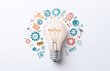 © Quality One   - light bulb surrounded by gears and various symbols representing ideas and creativity. This captures essence of innovation and inspiration in visually engaging way