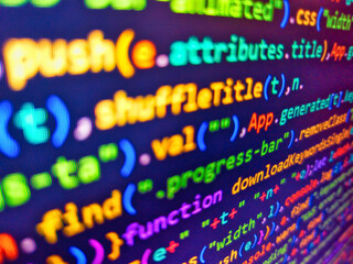 fundamental and technical analysis concept. programmer monitor with php language code. abstract comp