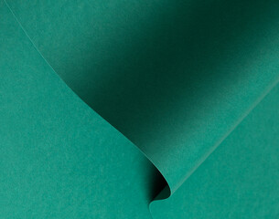 Fototapete - Emerald green paper background with a matte finish and subtle wavy texture. Deep green tones create