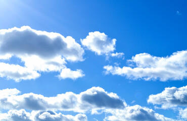 Wall Mural - blue cloudy sky, natural background with blue sky with clouds