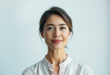 Wall Mural - Half-length portrait of a female with a calm expression