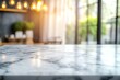 © JAYDESIGNZ - A marble countertop with blurred of a bright, modern kitchen.The soft focus on the interior background highlights.making it ideal for showcasing kitchen-related products