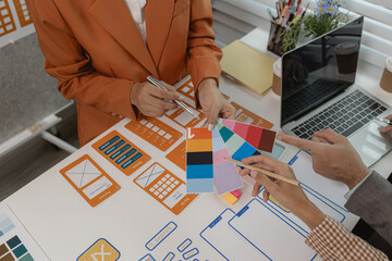 Wall Mural - the development team is consulting on the design of the website ux ui, they are working on project o