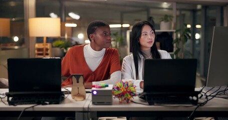 Computer, web development and question with business women in office at night for project management. Collaboration, creative and feedback with website developer people in workplace for programming
