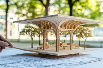 Aufkleber - A detailed architectural model showcasing a pavilion with trees and seating.