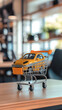 © DeepView - A miniature yellow car sits in a shopping cart on a wooden table, blending playfulness and commerce.