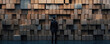 © JackBoiler - Man contemplating wall of cubes contemplative pensive thoughtful mystery challenge decision choice business career future wood cube brown dark wall structure pattern texture background design