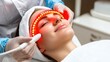 © Tam5 - Woman Enjoying Red Light Therapy Facial Treatment at Spa for Skin Rejuvenation