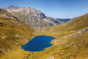 Wall Mural - Beautiful mountain lake in a mountain valley.