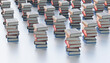 © Westend61 - 3D rendering of multiple stacks of books arranged in a patterned order.