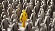 © Cliff - Yellow figure among gray figures, standing out, concept of individuality, uniqueness, leadership and distinction in a crowd of people