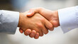 © uros - A professional handshake symbolizing trust, collaboration, and mutual understanding in a successful business partnership, fostering unity and commitment for a positive alliance.
