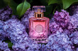 © Pisahouse - Perfume flower, A delicate pink perfume bottle nestled among vibrant purple lilacs, exuding elegance and floral beauty.