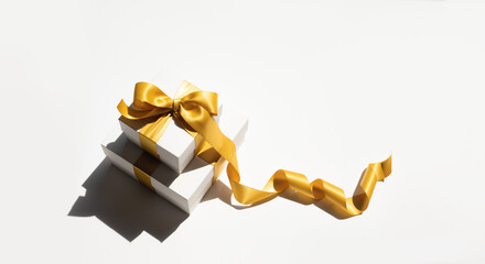 Wall Mural - luxury gift box with stream ribbon bow for celebration advertising template design.anniversary and s
