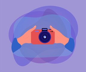 Wall Mural - hands of person holding camera and taking selfie. front view of photo camera flat vector illustratio