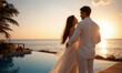 © RooftopStudioBangkok - couple embraces by pool at sunset, surrounded by tropical scenery, creating romantic atmosphere. warm glow of sun enhances their intimate moment