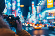 © Ilia - Capturing vibrant nightlife in a bustling neon-lit cityscape