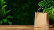© Butsarakham - A simple brown paper bag sits on a wooden table against a backdrop of lush green foliage.