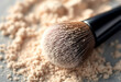 © Iremia - A close-up shot of a powder makeup brush with a glossy black handle and a soft, fibrous bristle head