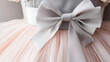 © Lale - Elegant Pastel Pink Tulle Dress with Grey Bow Detail