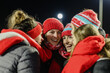 © Khelga Volkova - Group of friends watching a live game tackle, intense expressions, bright setting, warm and exciting