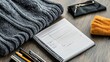 © nakarin - Essential packing list notepad with clothing items for travel cozy indoor setup top-down view organization