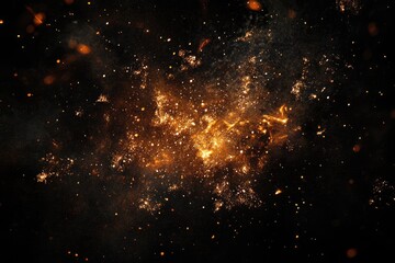 glowing embers and sparks exploding in the dark