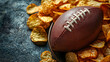 © Atmospheric stock - Football and crunchy chips - perfect party snack duo