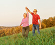 © Lumos sp - woman man outdoor senior couple happy lifestyle retirement together smiling love dancing nature mature