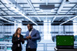 © DC Studio - Focus on mockup laptop used by coworkers in data center ensuring cybersecurity and efficient network management. Close up of green screen notebook in server hub optimizing data center equipment