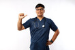 © ArvStd - Professional confident male asian doctor, nurse in scrubs pointing at herself and smiling, guarantee she knows what do, white background