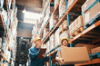 © Davor - Warehouse workers organizing boxes and inventory management