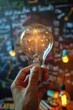 © Ева Поликарпова - A person holds a light bulb near a chalkboard, ready to illuminate an idea
