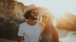 © ABIDZAR ALFAREZ - Happy couple enjoying sunset on beach.