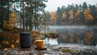 © anantachat - A quiet lakeside moment with coffee and soothing music from a portable speaker Stock Photo with side copy space