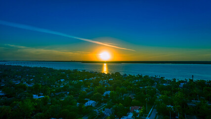 Wall Mural - a sunset over a lake - illustration.