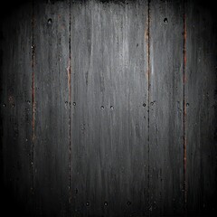 A textured black wooden surface with a weathered appearance.