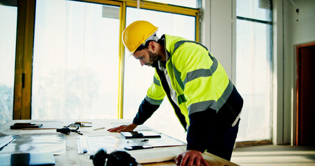Fototapete - Architecture, planning and blueprint with man on construction site for building, real estate and inspection. Engineer, industrial and property developer with person for contractor and renovation