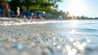 © Narongsag - Sparkling Beach Water  Sunlit Pebbles  Summer Vacation Background