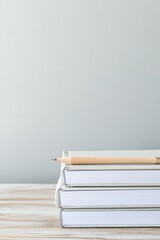 Aufkleber - Minimalist Notebook and Pen on Wooden Desk with Soft Lighting