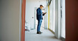 © peopleimages.com - Man, tablet and inspection for renovation at property with scroll, contact and check notification for deal. Person, architect or engineer with digital touchscreen, app and checklist for real estate