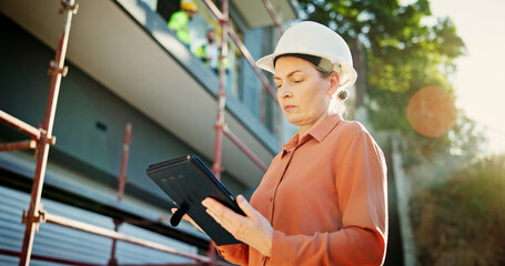Poster - Construction site, thinking and woman with tablet, engineering and app with online checklist. Person, architecture and employee with hard hat, technology and building project with schedule and typing
