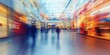 © Nijat - Blurred perspective of a shopping centre captures the lively atmosphere of the shopping centre, highlighting the dynamic nature of the shopping centre experience.