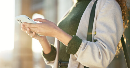 Canvas Print - Hands, scroll and phone with woman in city for direction, location app and travel. Social media, search and online map with closeup of person and mobile in Brazil for navigation, network or adventure