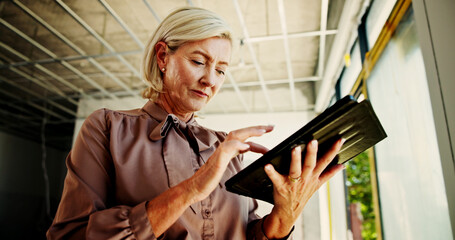 Poster - Construction site, typing and woman with tablet, engineering and digital app with online schedule. Mature person, architecture and employee with network, tech or connection with decision and choice
