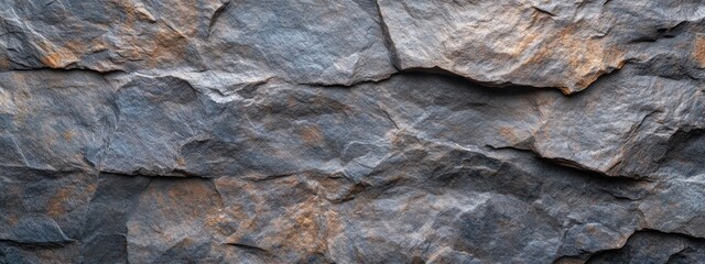 Aufkleber - Close-up view of textured slate rock surface with natural patterns and earthy tones.
