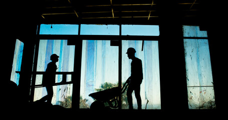 Poster - Silhouette, people and engineering with construction site, teamwork and building development. Employee, shadow and architecture with wheelbarrow, dusk and renovation with equipment or cooperation