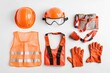 © khalid_spk - A set of bright orange construction safety gear including a hard hat safety goggles