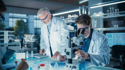 Aufkleber - Head of Laboratory Making a Bioengineering Experiment with a Group of Young Science College Students. Future Specialists Working with Modern Microscopes, Using Tablet and Laptop Computers